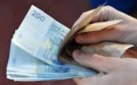 Le dirham monte face au dollar